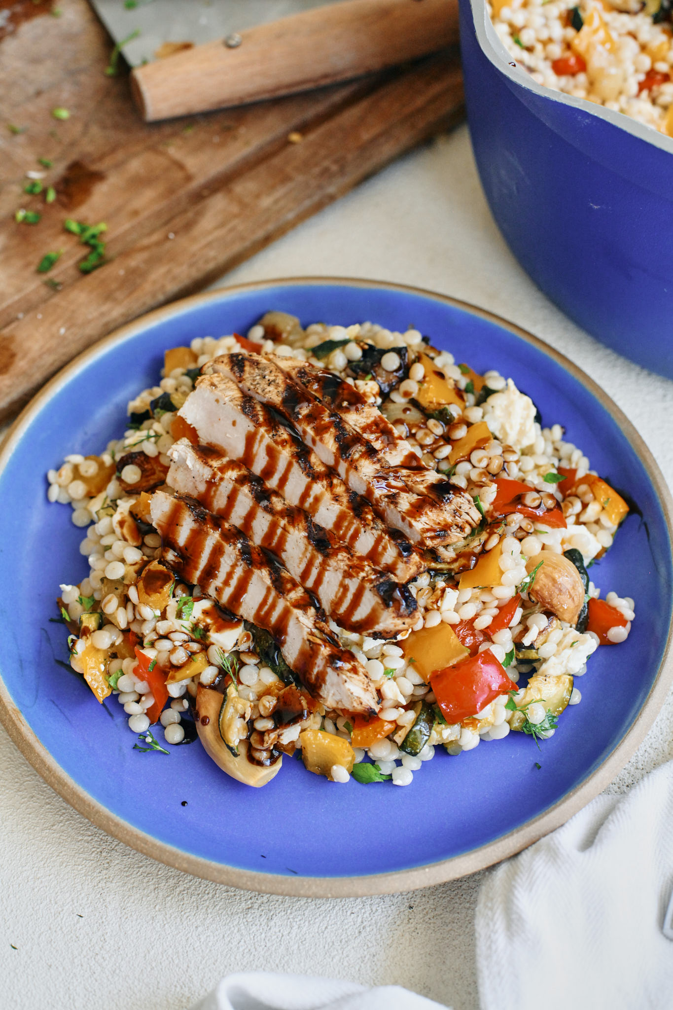 pearl couscous with grilled chicken and balsamic on top