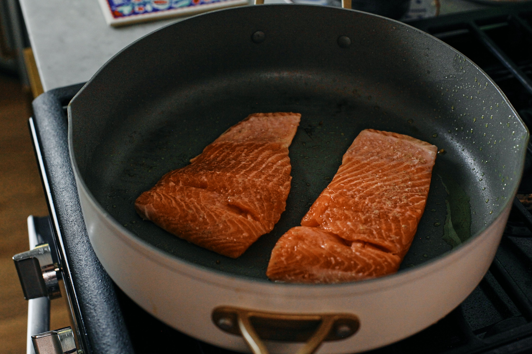 salmon searing in the pan