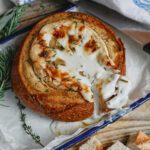 garlic confit baked brie in sourdough