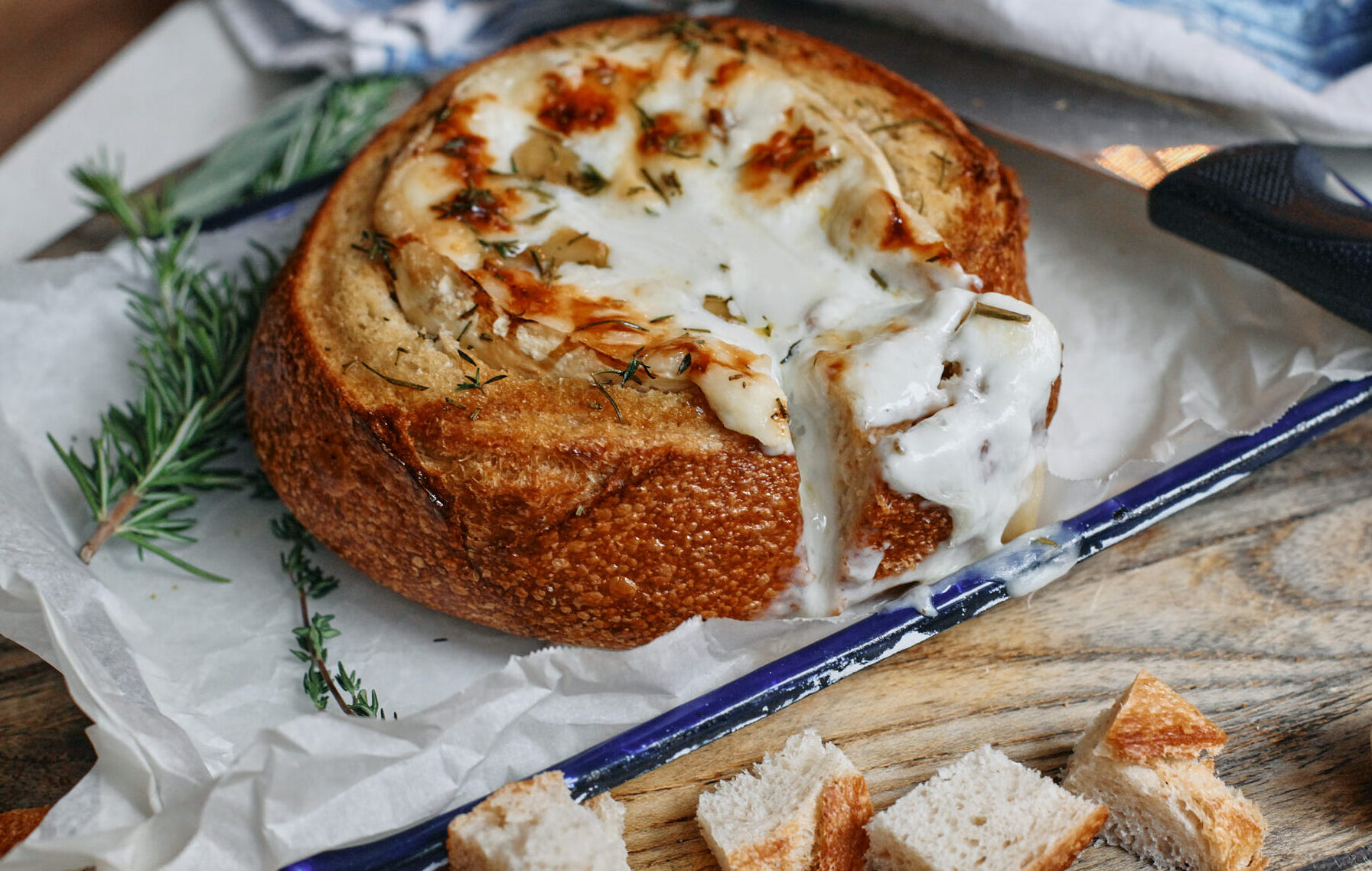 garlic confit baked brie in sourdough
