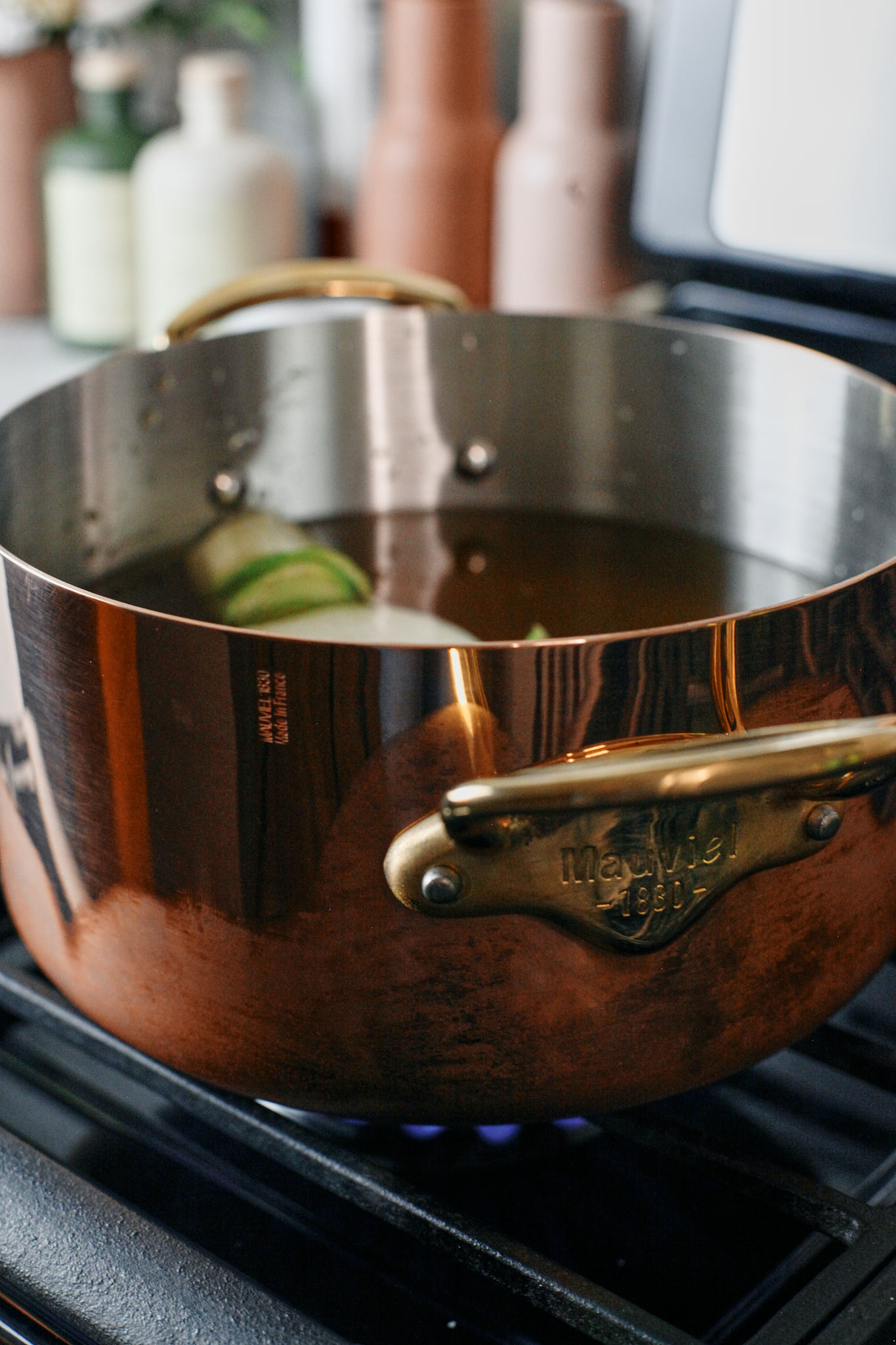 pot of vegetable stock, water and vegetables