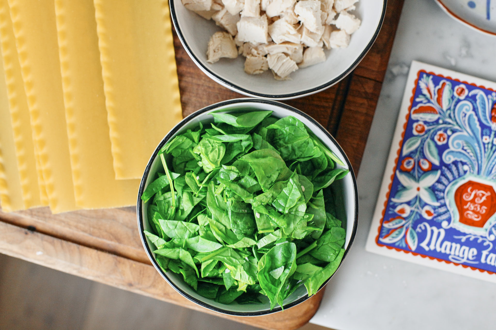 spinach and chopped rotisserie chicken for the creamy chicken lasagna soup