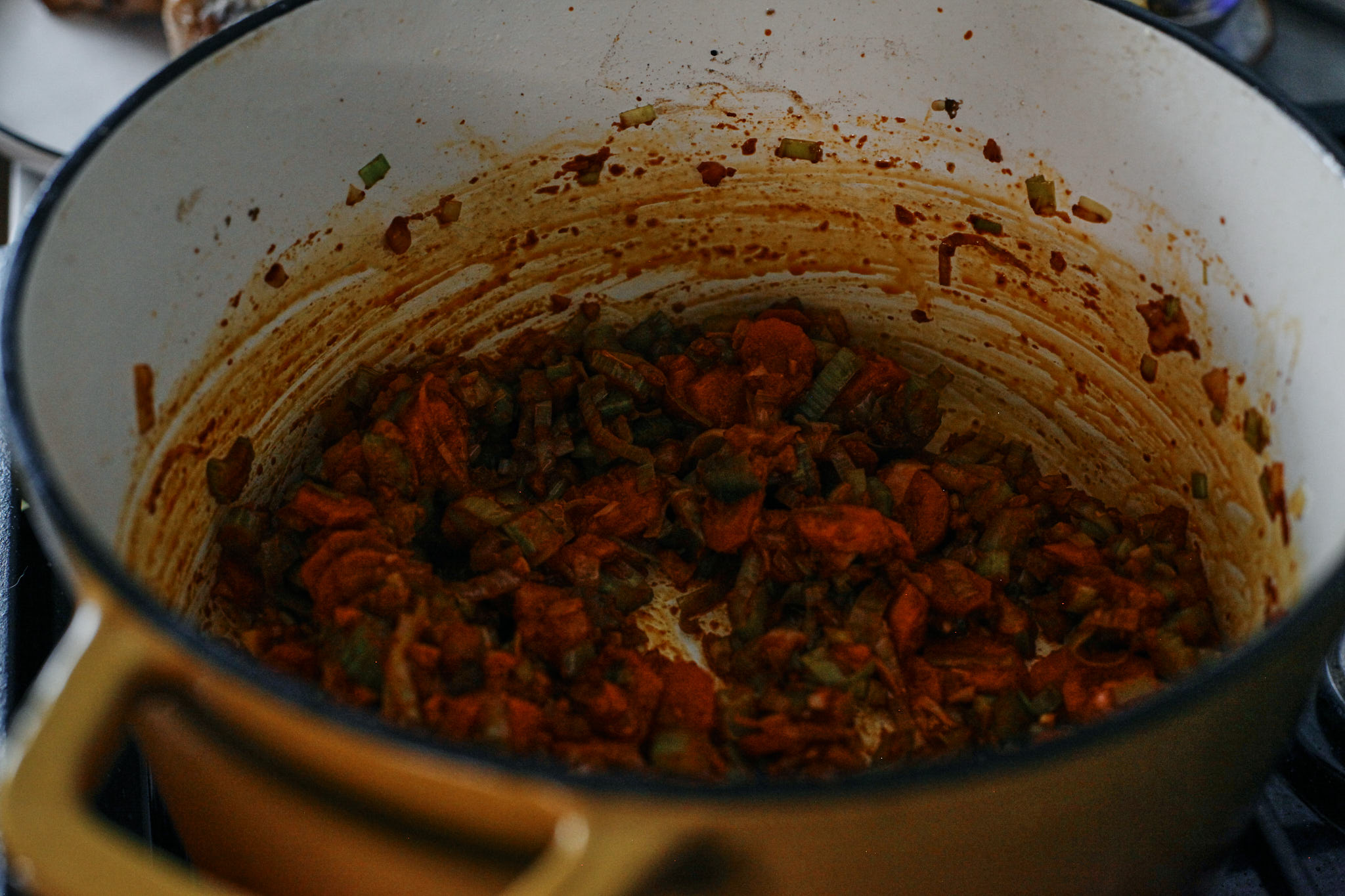 sauteed vegetables with tomato paste in the large pot