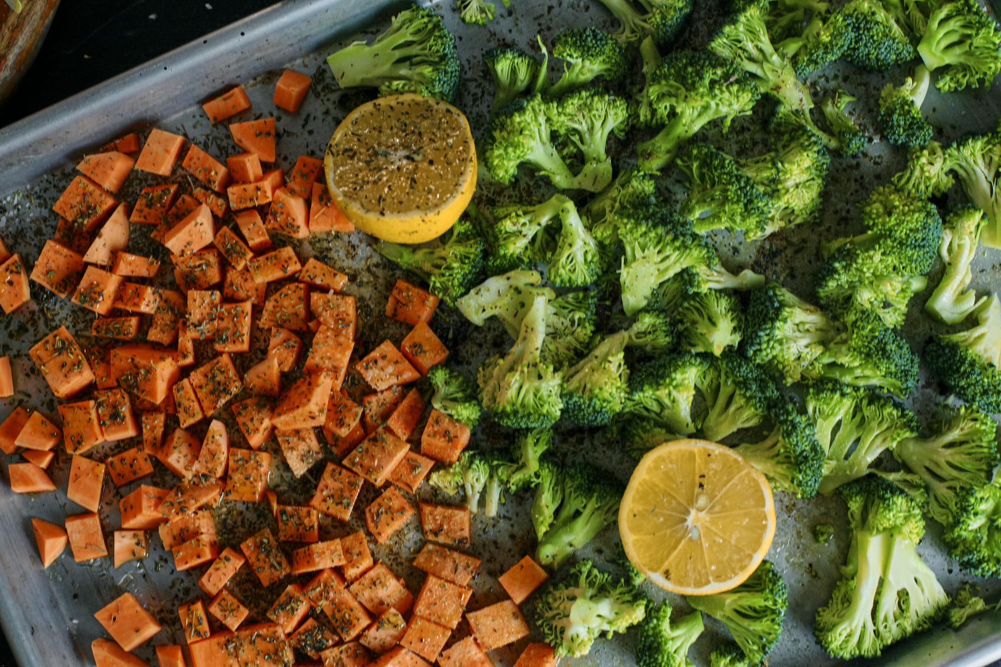 prep for warm rustic tortellini bowl - cubed up sweet potato and chopped broccoli with a lemon