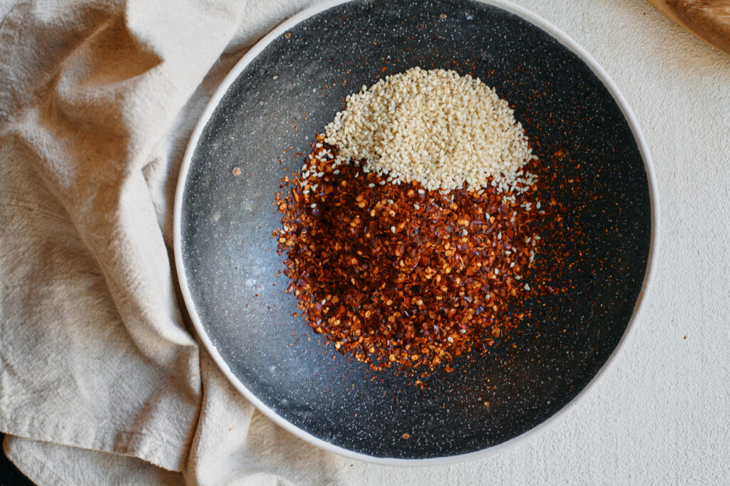 red chili flakes and sesame seeds