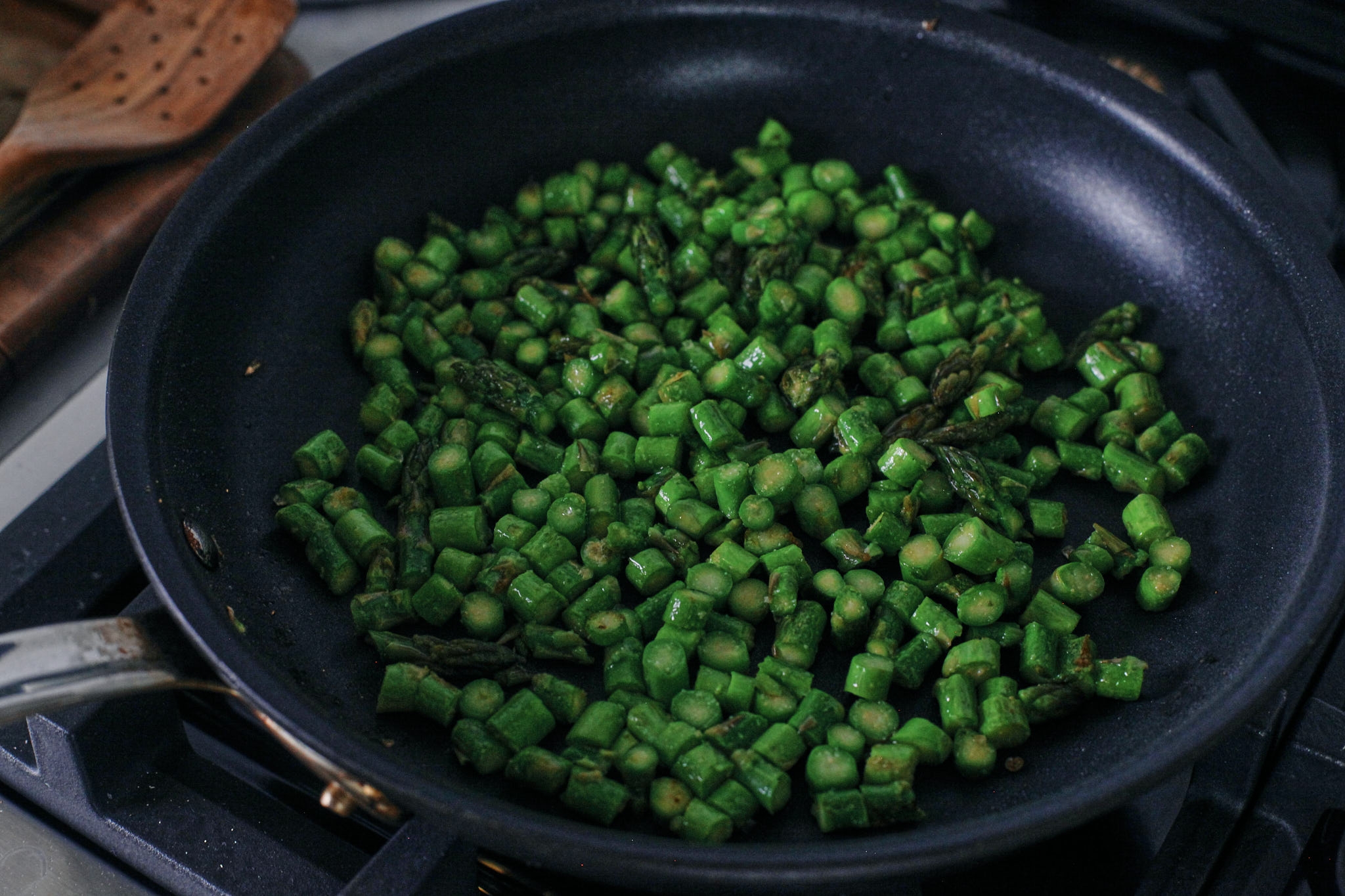 sautéeing the chopped asparagus