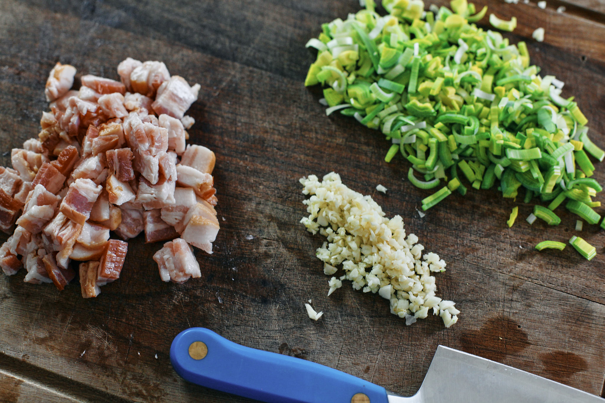 chopped bacon, garlic and leek