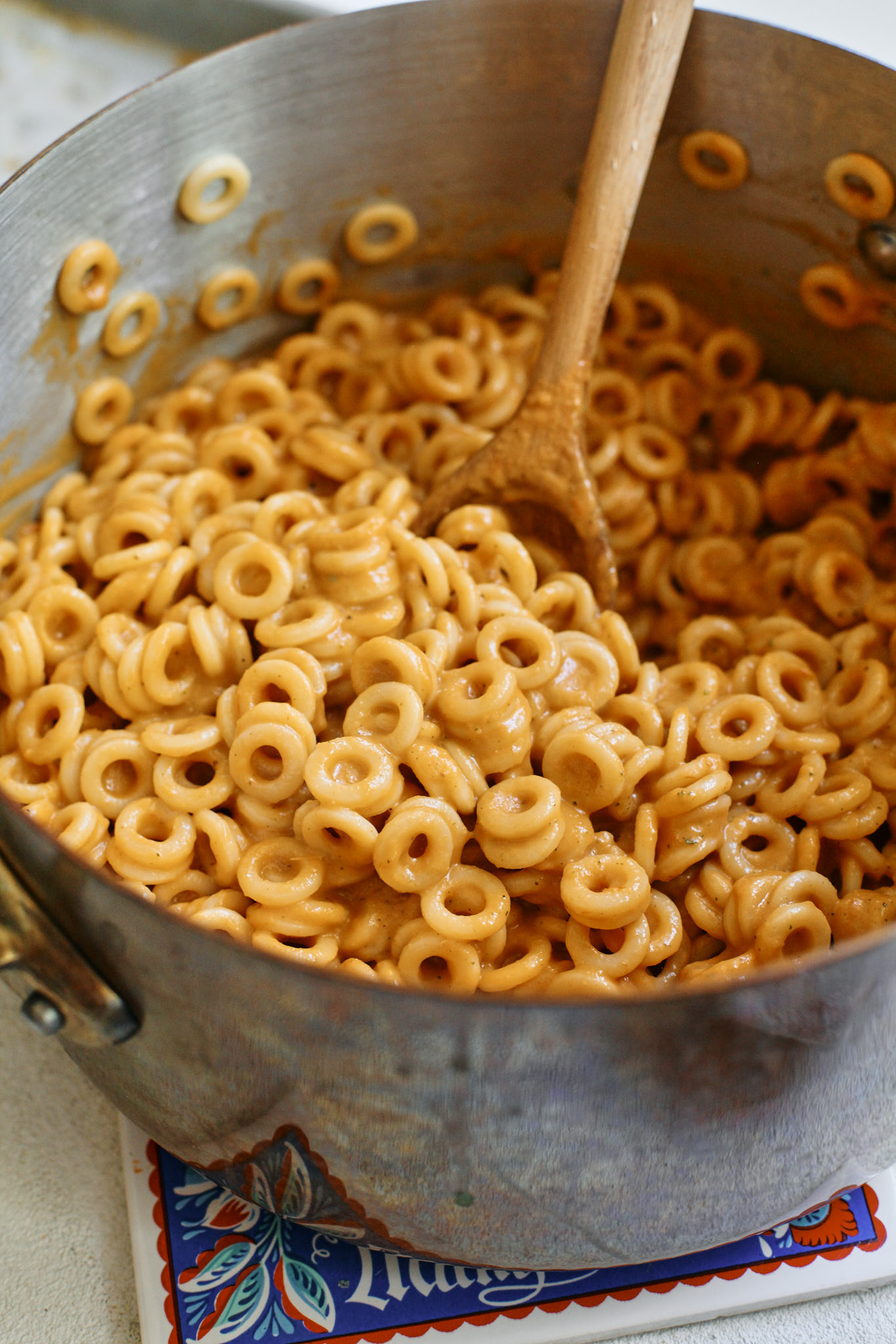 spaghettios mixed with the golden vegetable sauce
