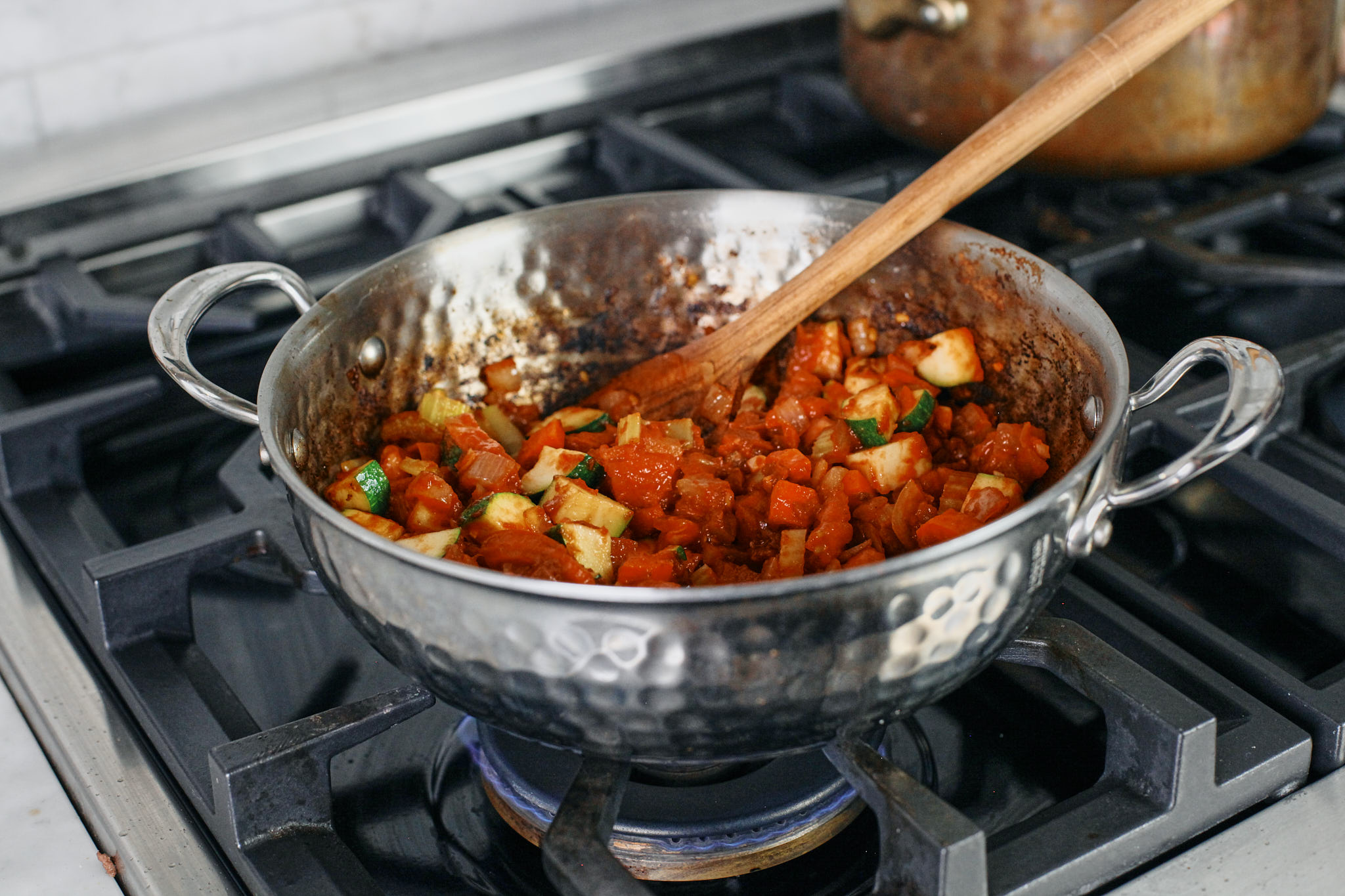 vegetables cooking with tomato paste