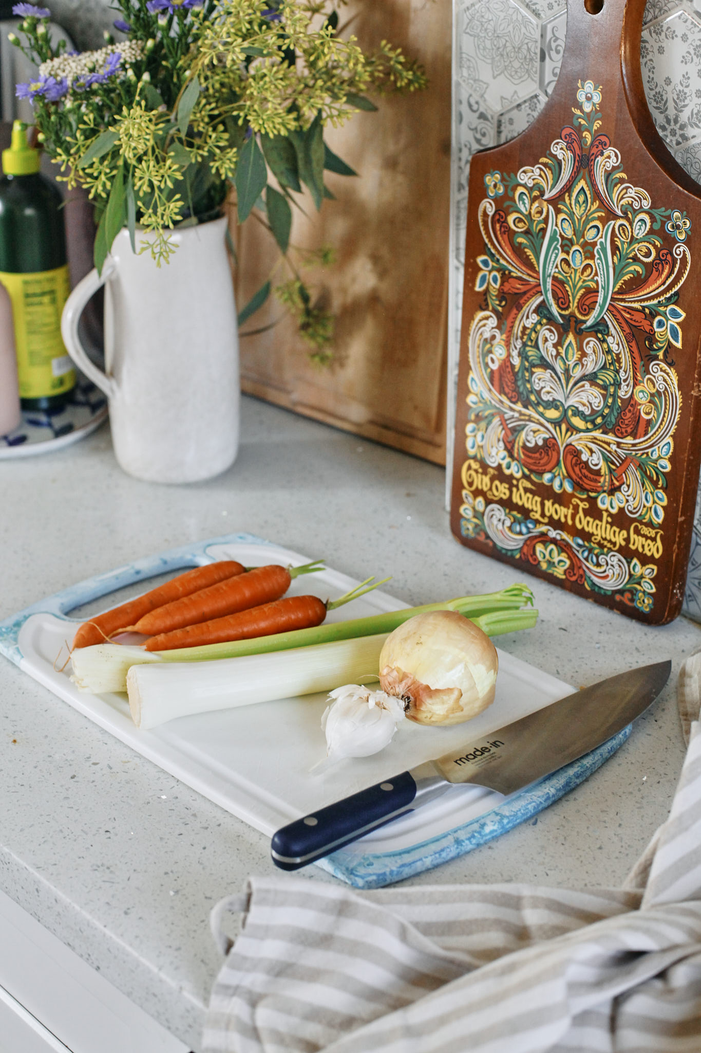 prep for hidden vegetable gnocchi soup: carrot, celery, leek, onion, garlic