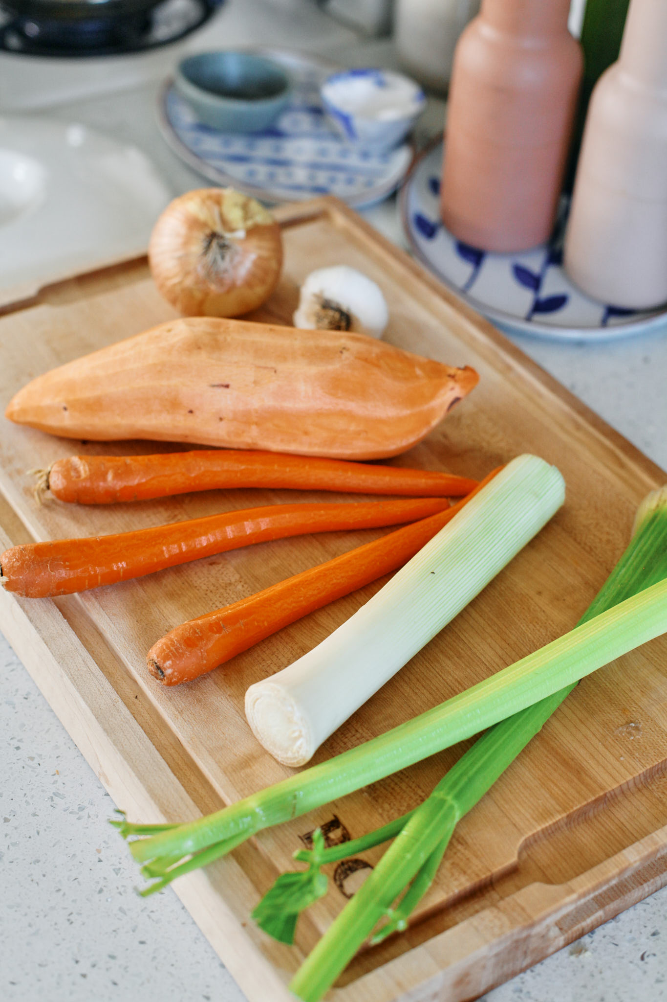 prep for the one pot lemon pepper chicken dish: 1 onion, garlic, 1 sweet potato, 3 carrots, 1 leek, 2 stalks of celery