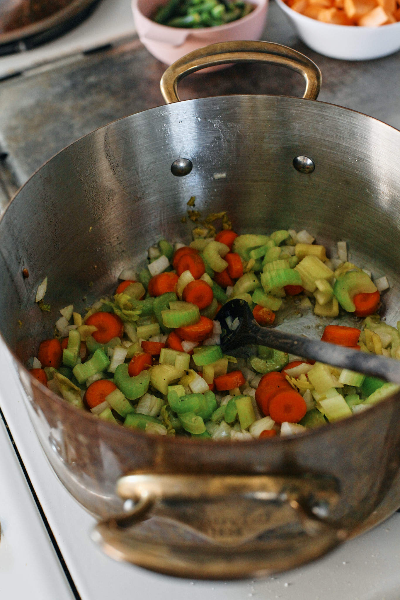 vegetables sautéeing in the pot