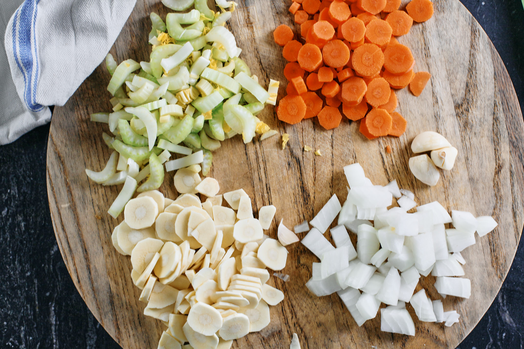 prep for the creamy tortellini vegetable soup: chopped celery, carrots, parsnip, onion and garlic