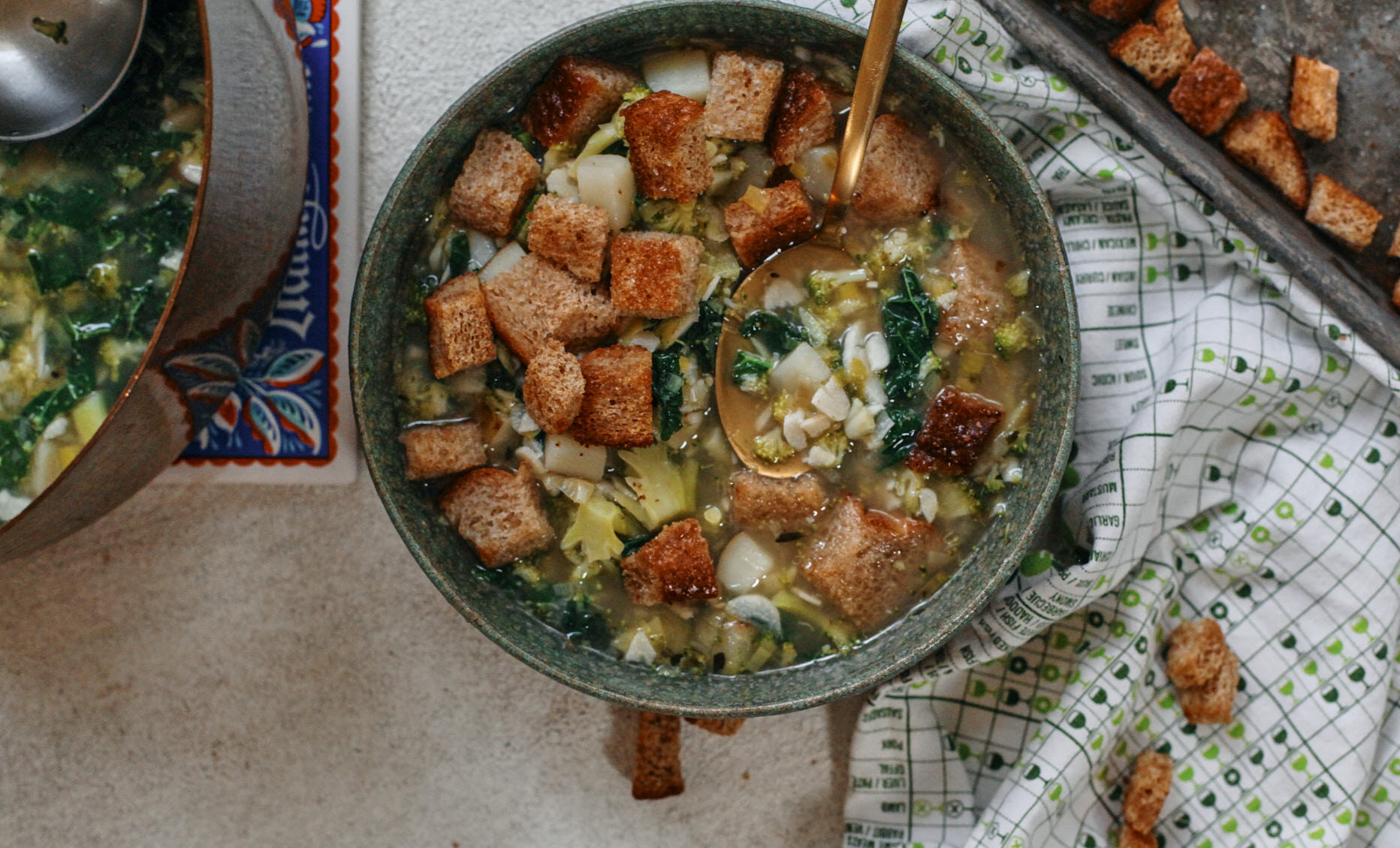 mighty greens garlic soup topped with croutons