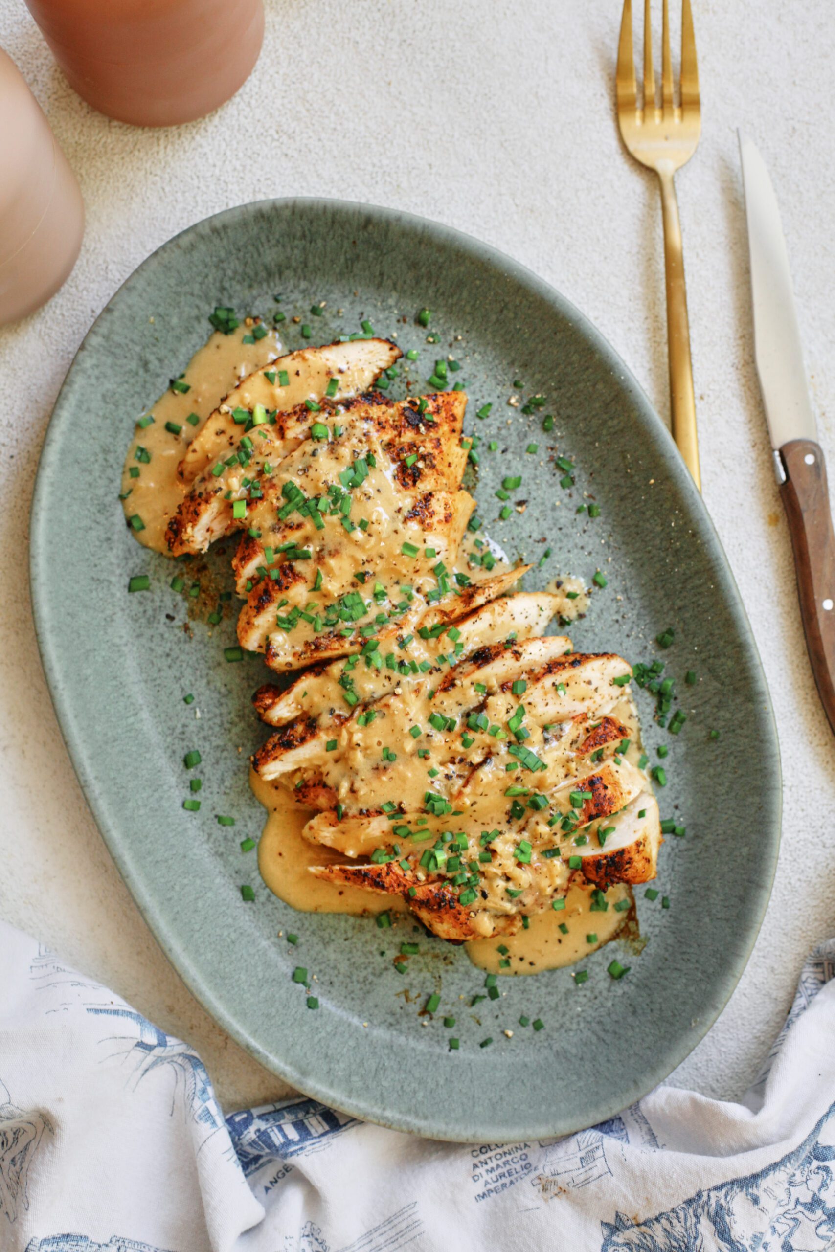 Chicken with Garlic Shallot Cream Sauce 28 sliced chicken breast with the garlic shallot cream sauce poured on top finished with chives