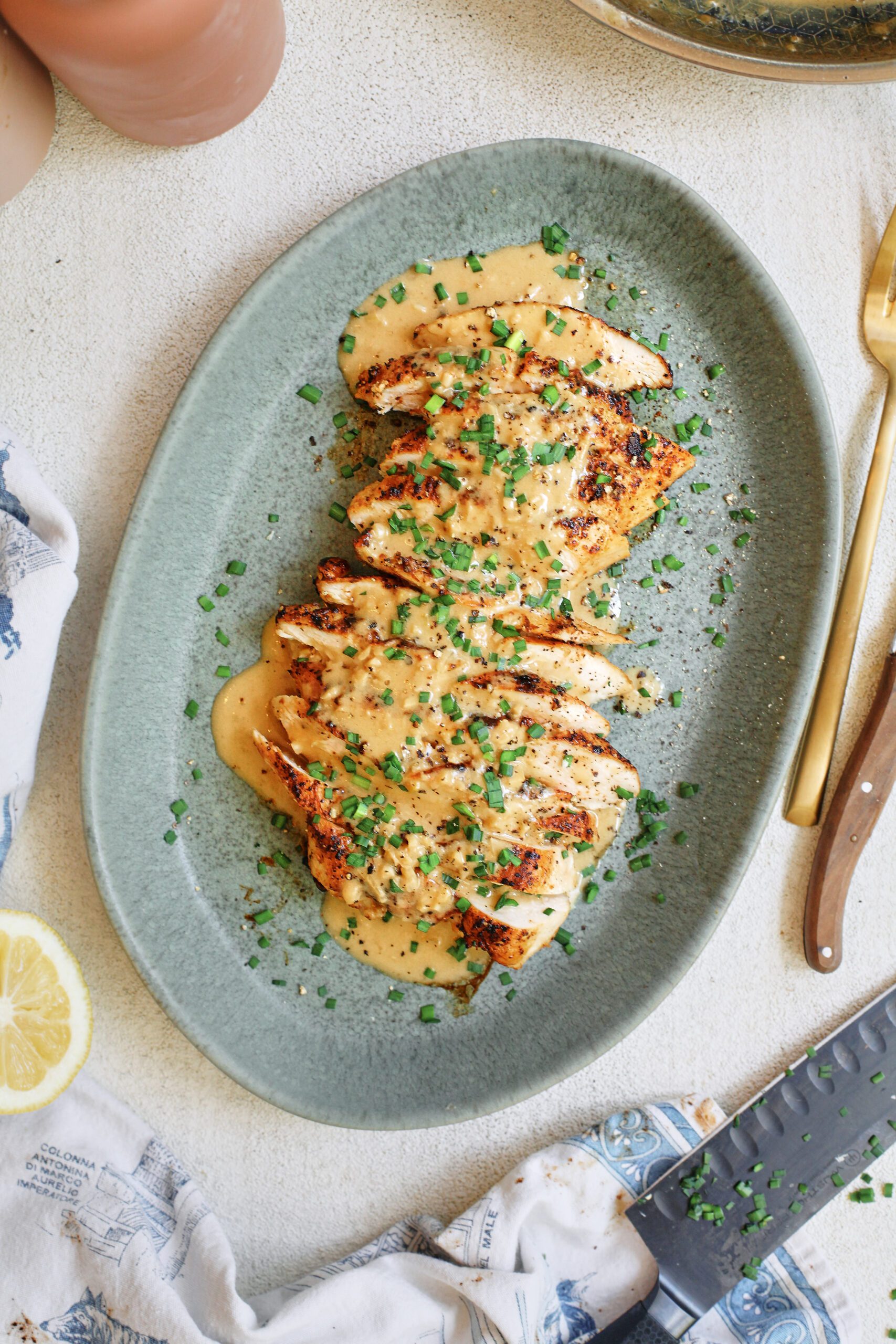 Chicken with Garlic Shallot Cream Sauce 34 sliced chicken breast with the garlic shallot cream sauce poured on top finished with chives