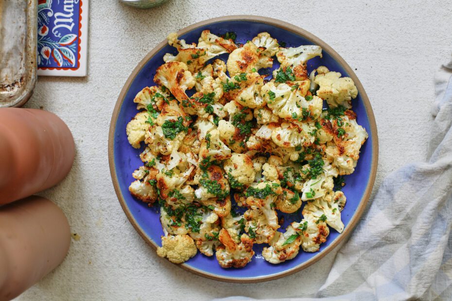 salt and vinegar cauliflower on a blue plate