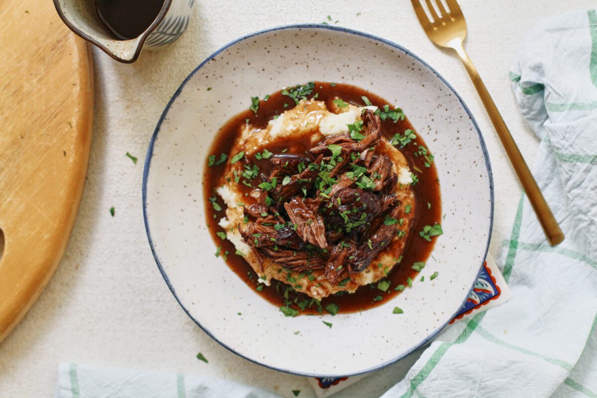 braised beef over mashed potatoes
