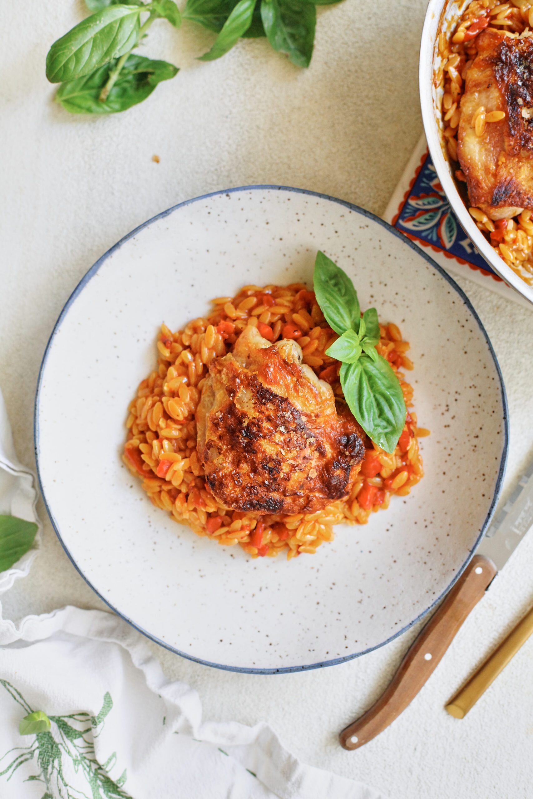 crispy chicken thighs with roasted red pepper orzo