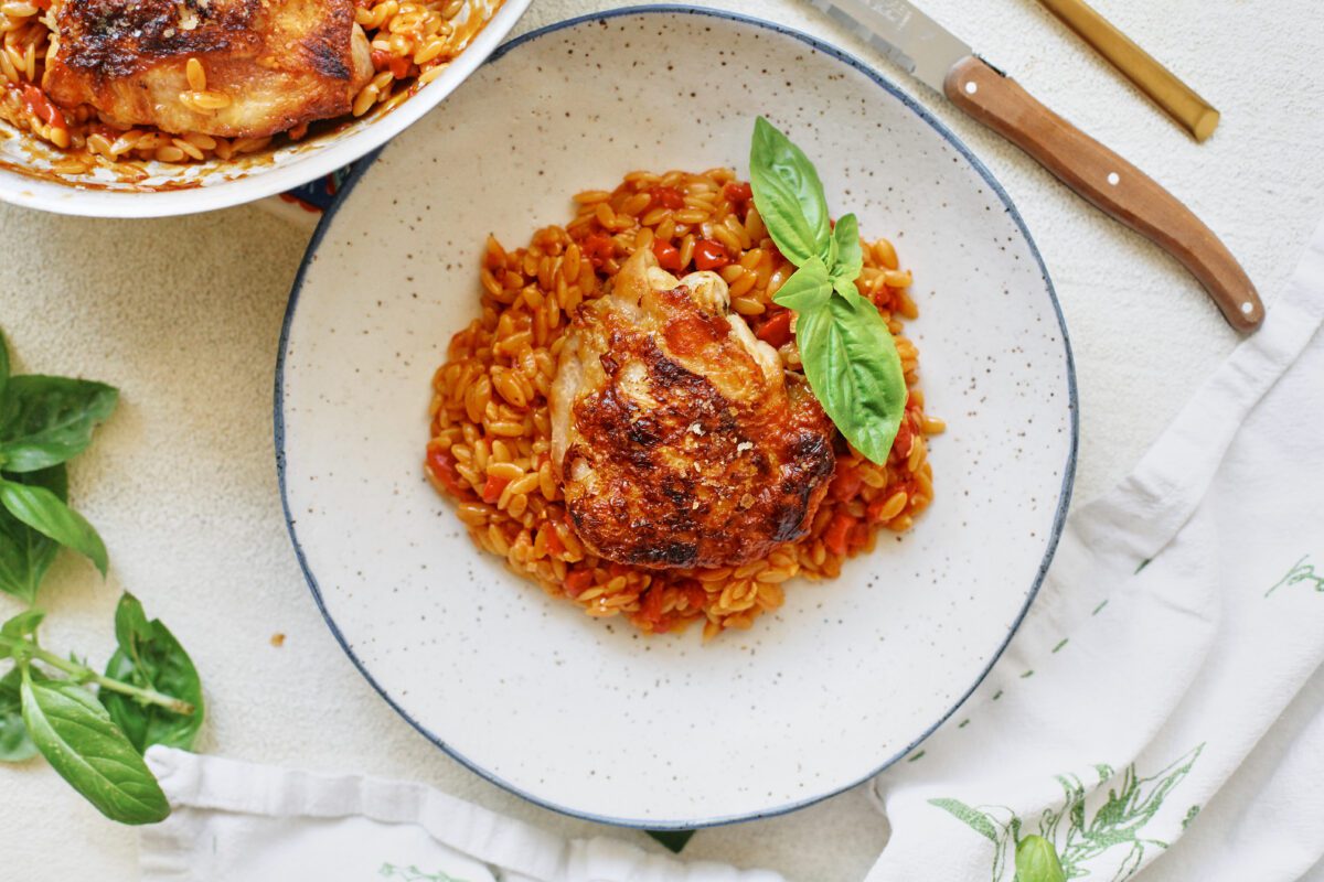 crispy chicken thighs with roasted red pepper orzo