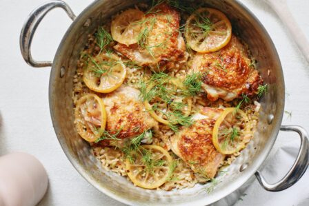 overhead photo of One Pot Lemony Dill Chicken and Rice in a deep hammered steel pan