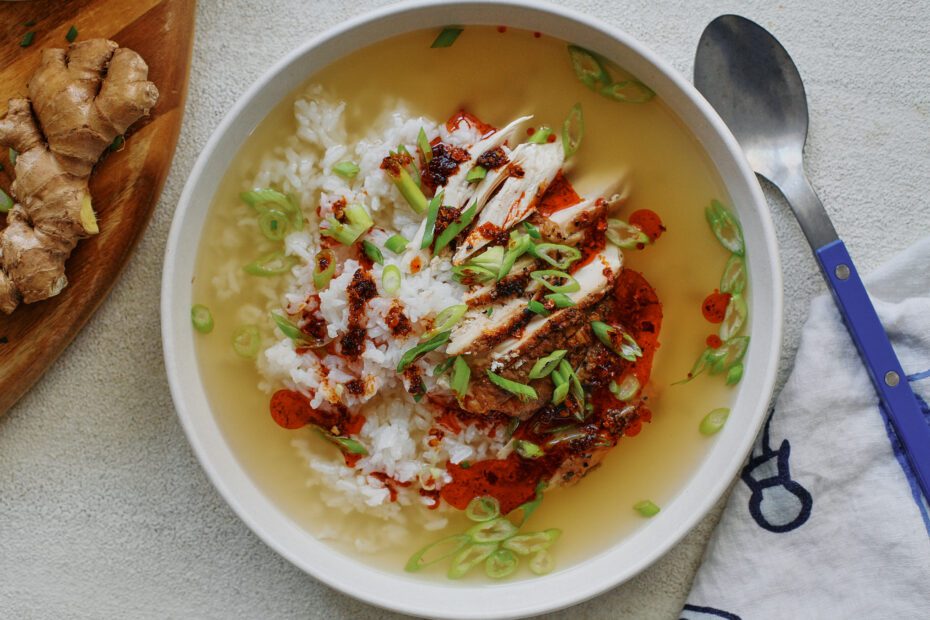 french press chicken and rice soup in a large, shallow white bowl