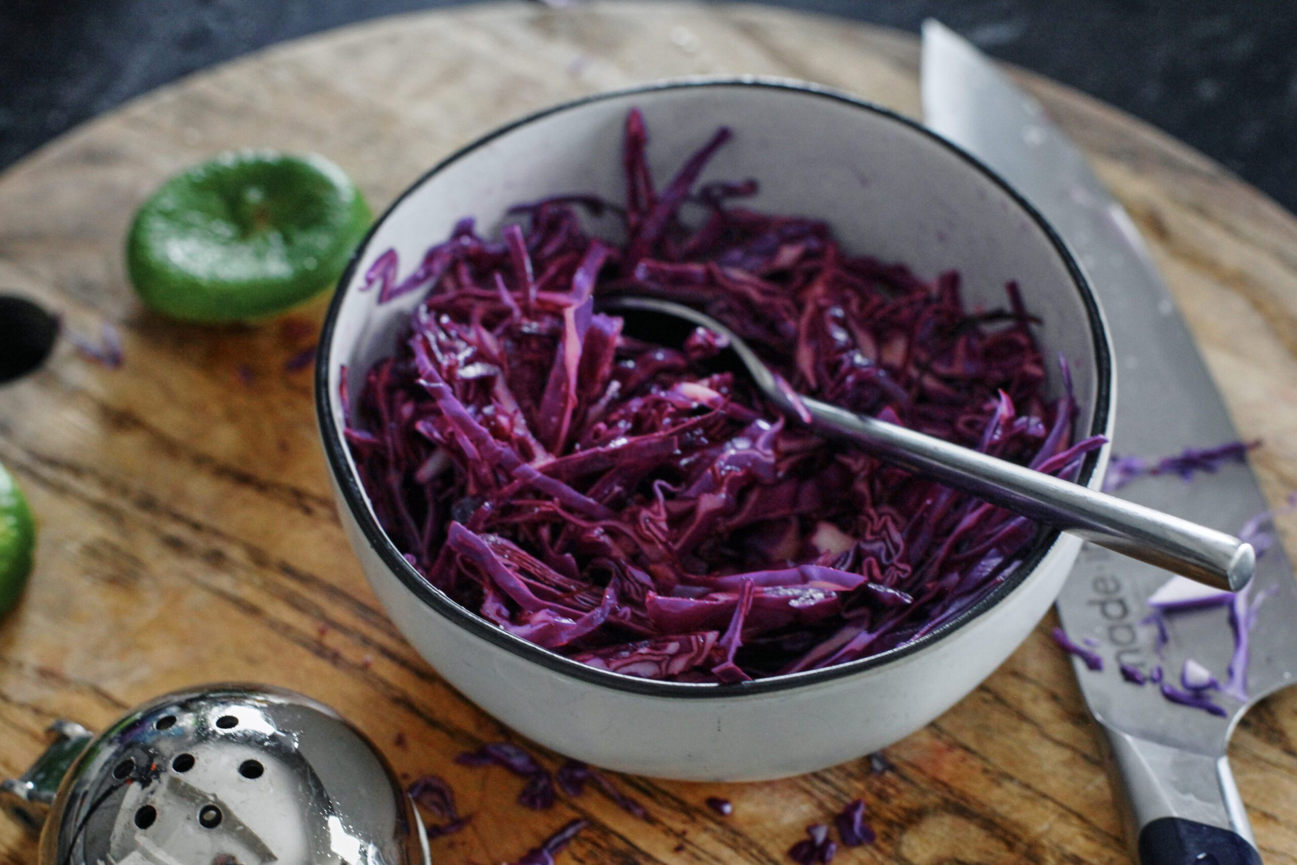 a bowl of purple cabbage slaw