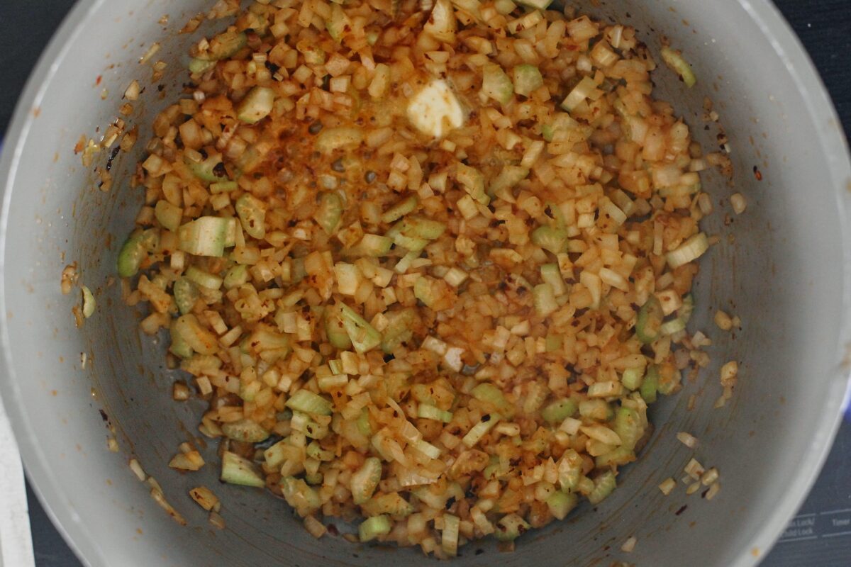 chopped fennel, celery, onion and garlic sautéeing in italian sausage fat in the large pot