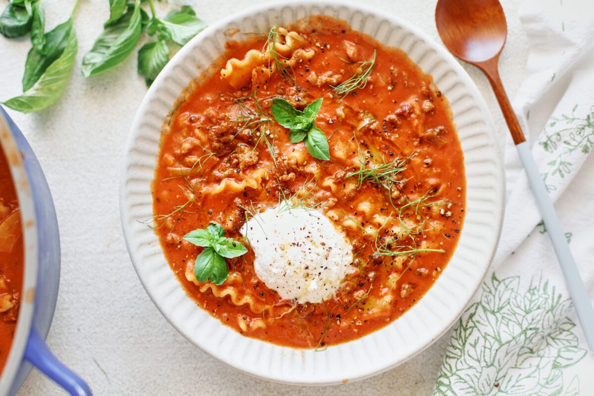 spicy italian sausage lasagna soup plated in a bowl