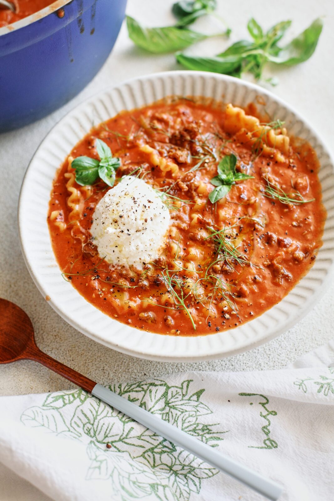 spicy italian sausage lasagna soup plated in a bowl