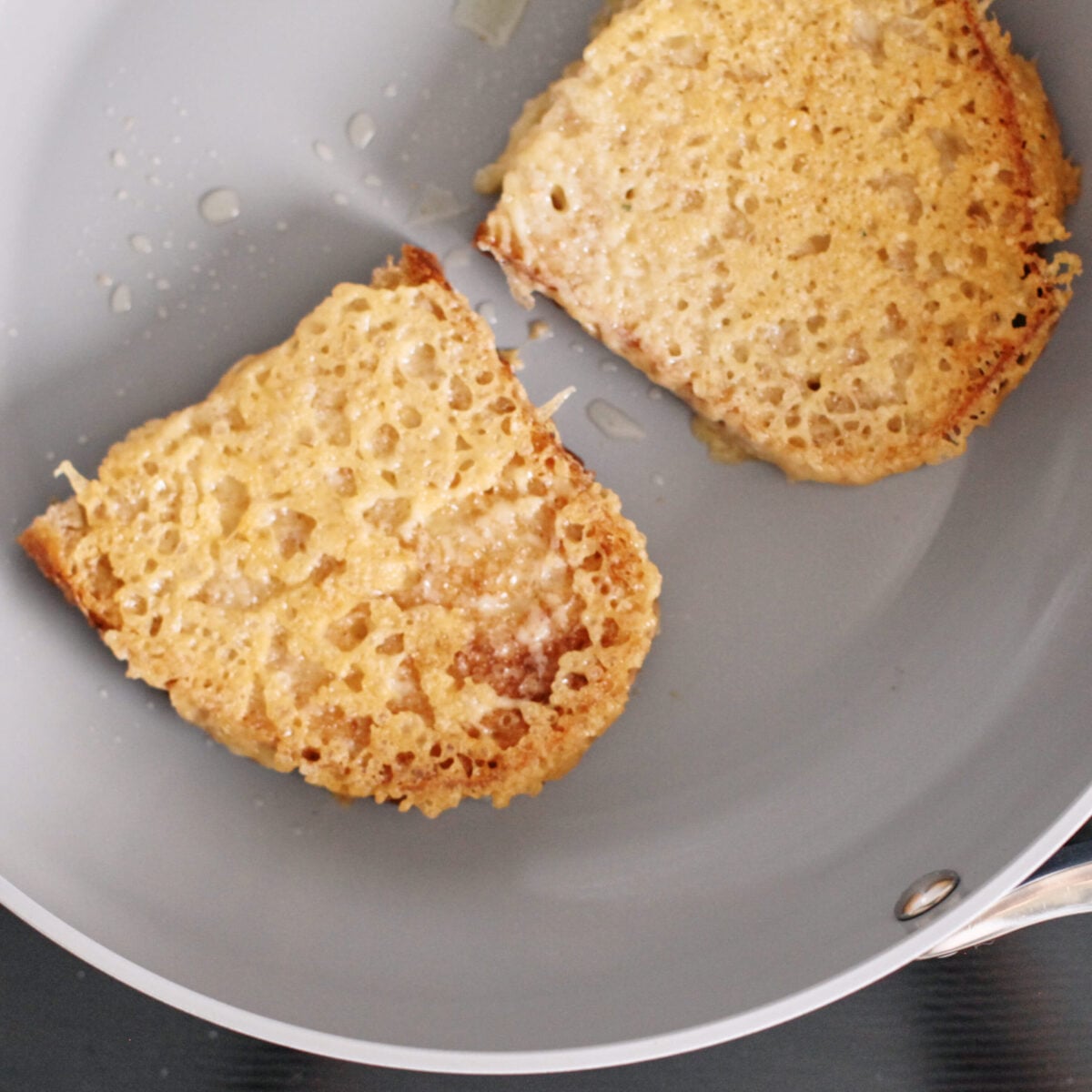 two pieces of cheesy toast